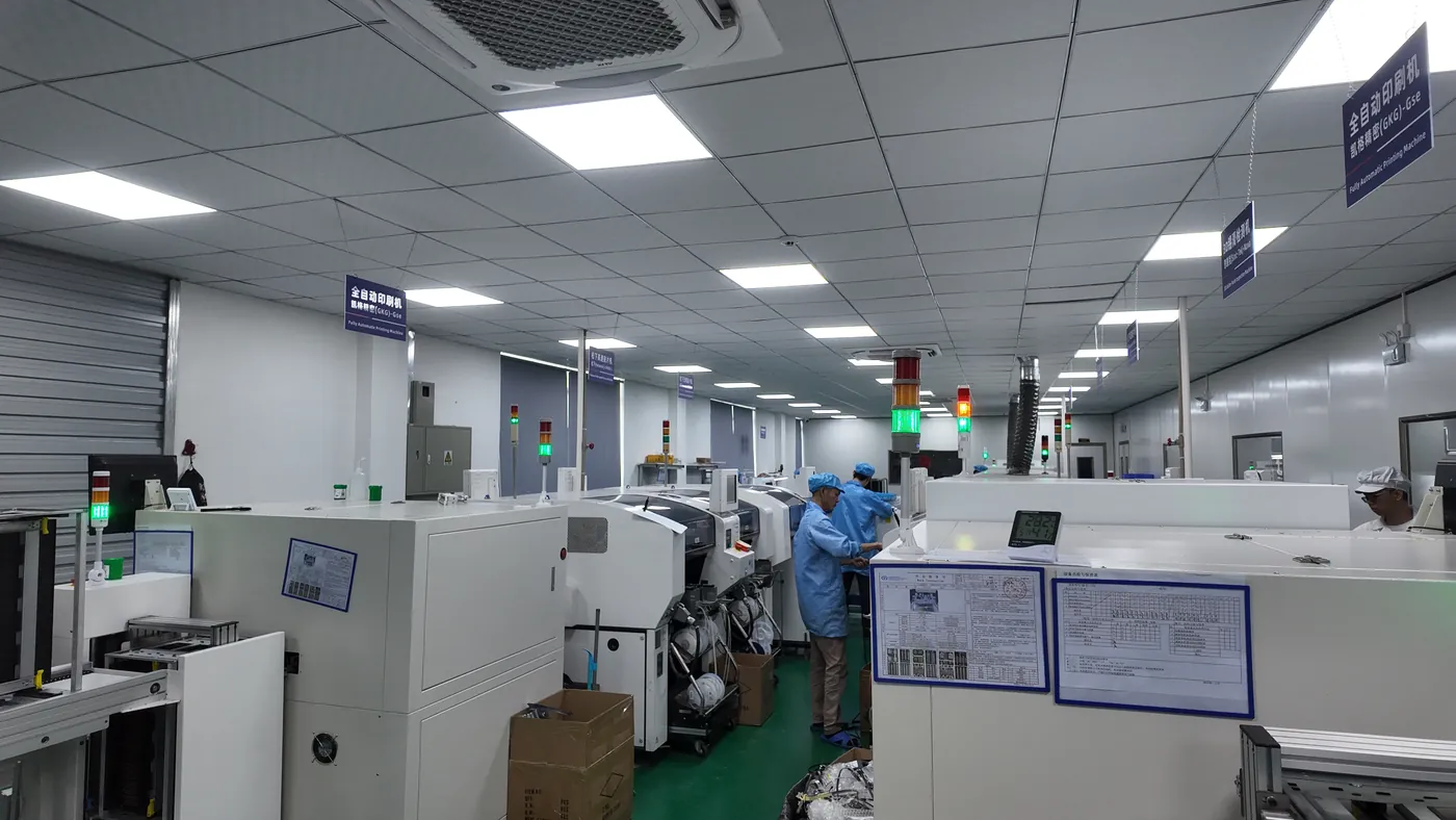 SMT machines in the PCB printing workshop